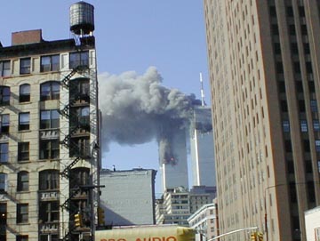 both towers on fire, 9:15am