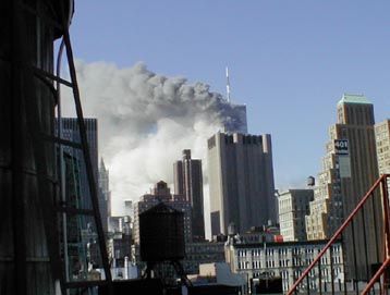 billowing smoke from tower 1